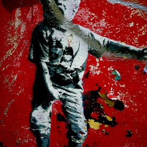 Street-art représentant un enfant criant sur fond rouge - France  - collection de photos clin d'oeil, catégorie streetart